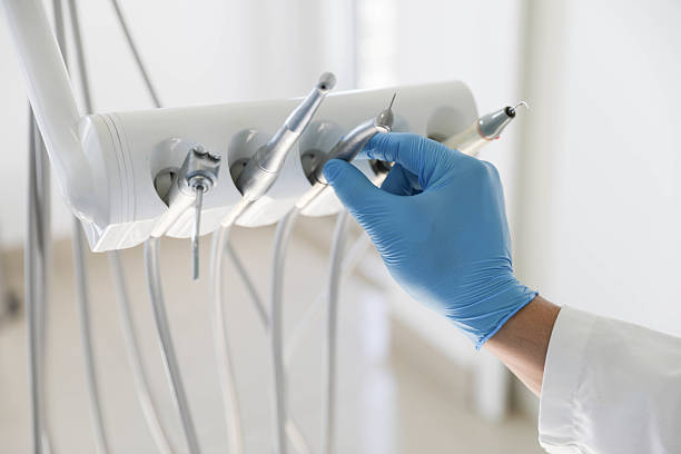 Professional Tooth Extraction technician working in Saunders Lake, OR